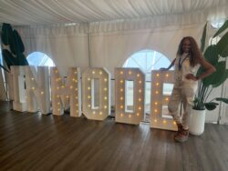 Dr. Wright and a large sign that says "Inmode"